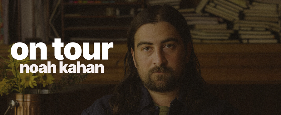 Noah Kahan looking directly at the camera with text 'on tour noah kahan' displayed.